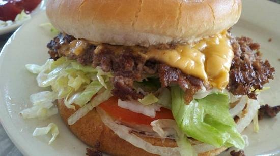 The Workingman's Friend signature dishes Smashed Double Cheeseburger with grilled onions, Giant Double, Pork Tenderloin Sandwich